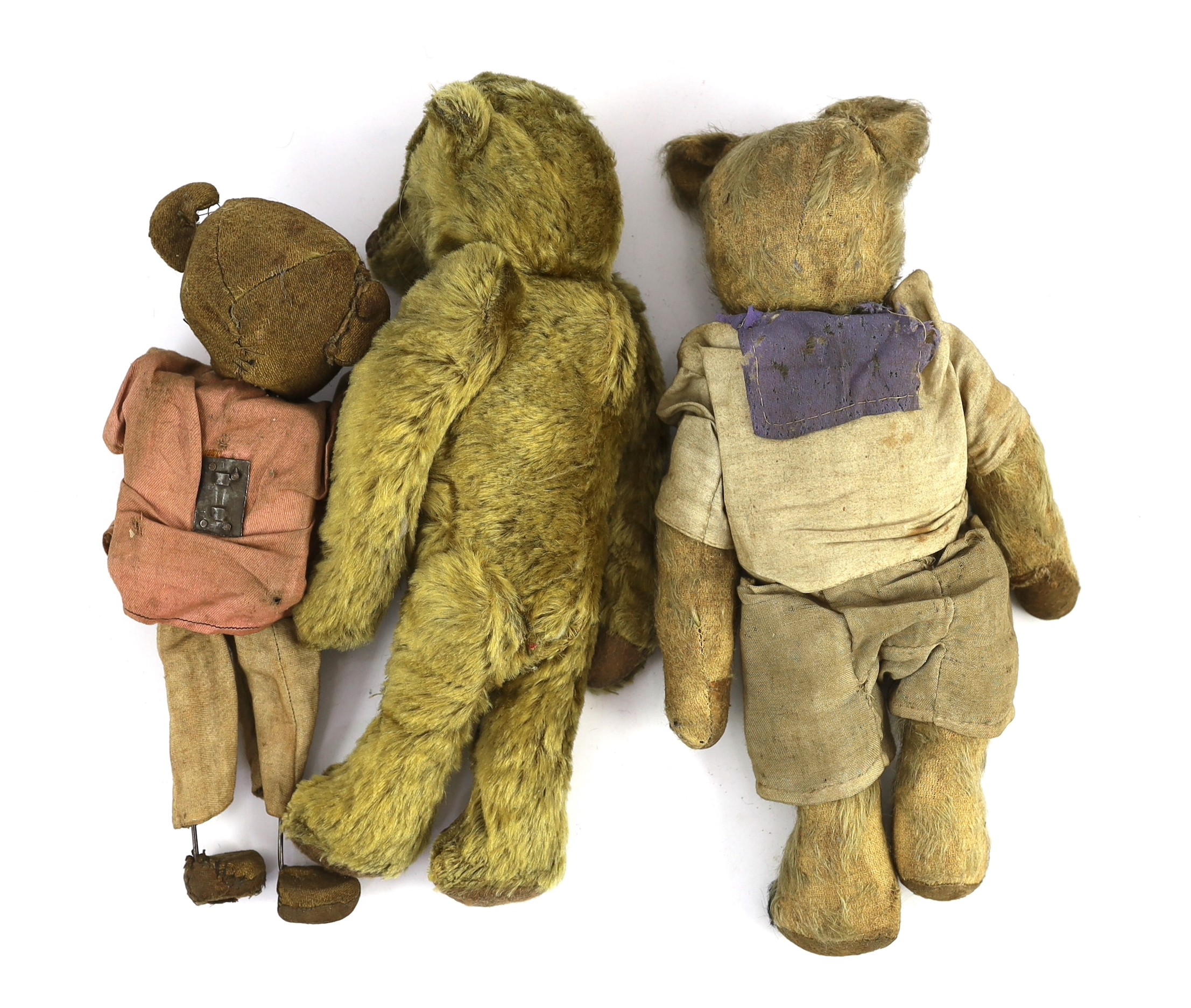 An early 20th century German Teddy bear, mohair plush and boot-button eyes, 12in., and two other Teddy bears